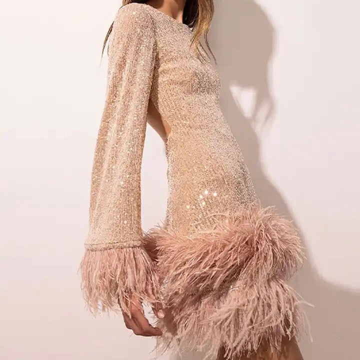 Sylis glamorous with sequins and feather hem