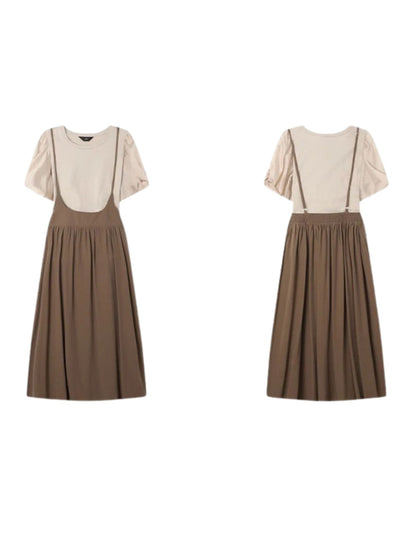 Flat lay of beige blouse paired with brown skirt