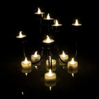 24-piece: Warm white tea lights timer flameless smokeless candles