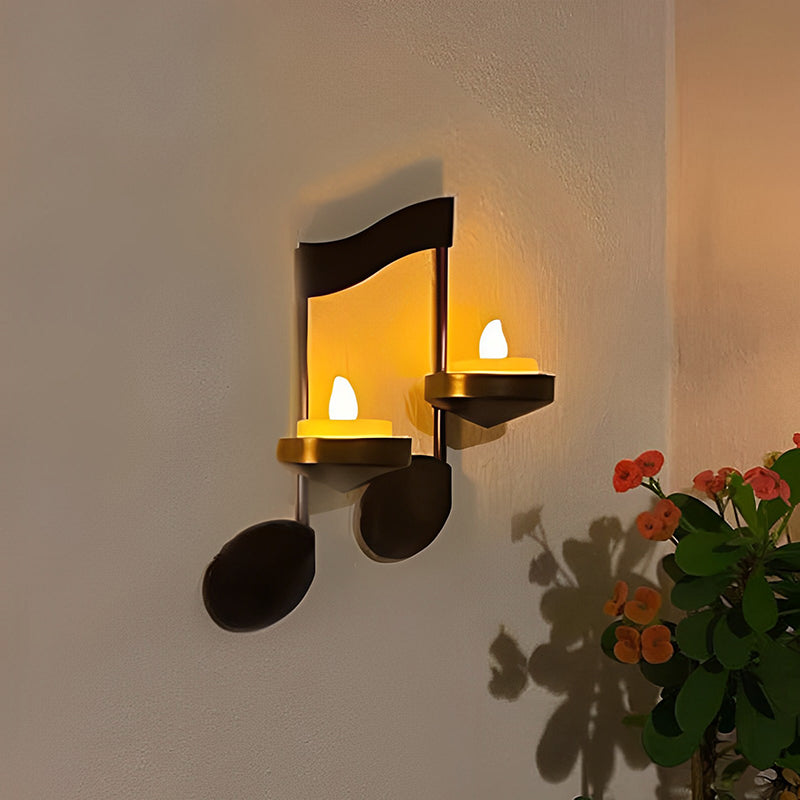Candle holder with music notes