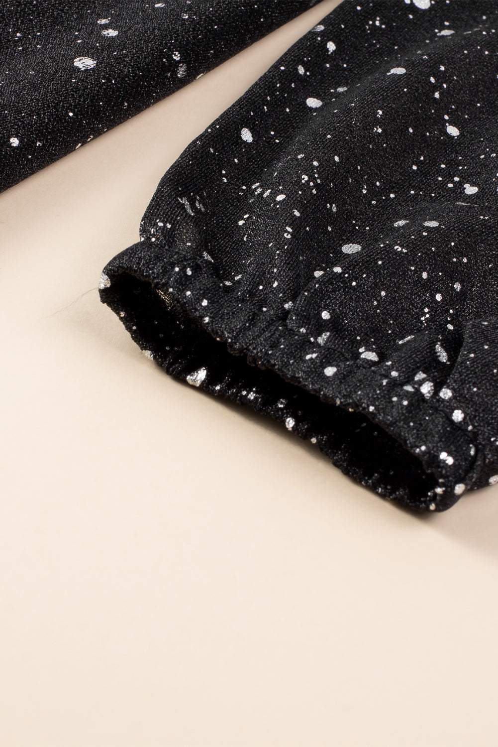 Sylis | Elegant black shimmering dress with mesh sieve