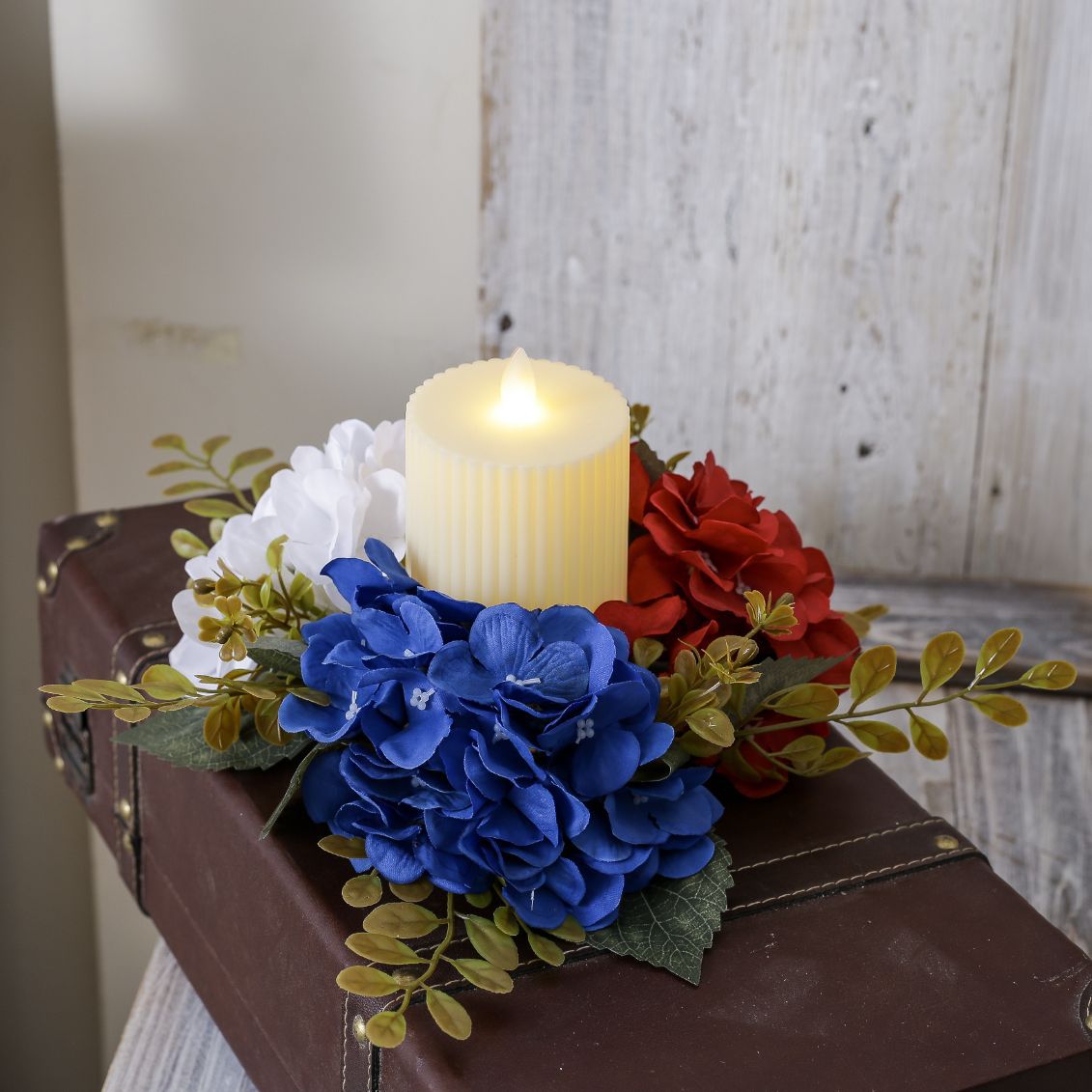 Unisex decorative candle plate with glass candle holder and artificial hydrangeas in country house style