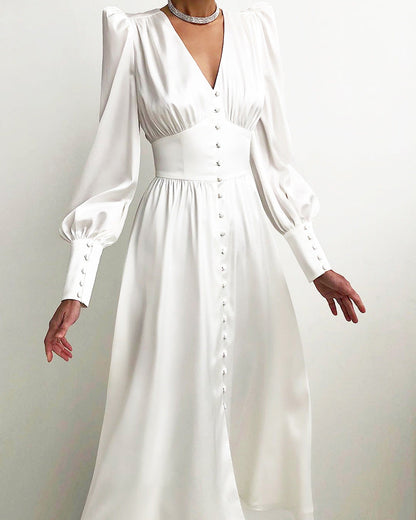 Sylis party dress with V-neck and puff sleeves for ladies