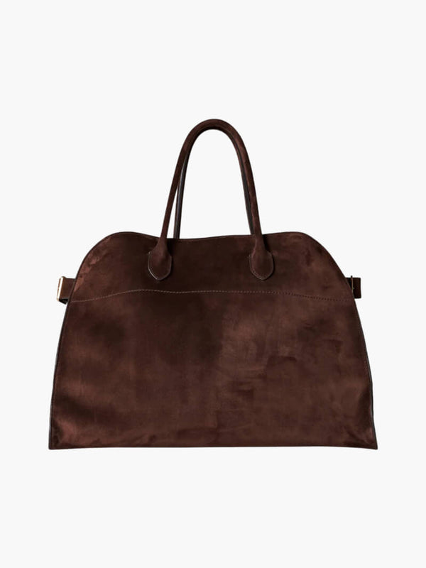 Brown leather bag on a white background