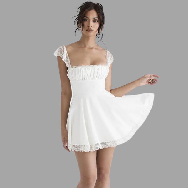 Sylis | Dress with lace appliques and flowy skirt