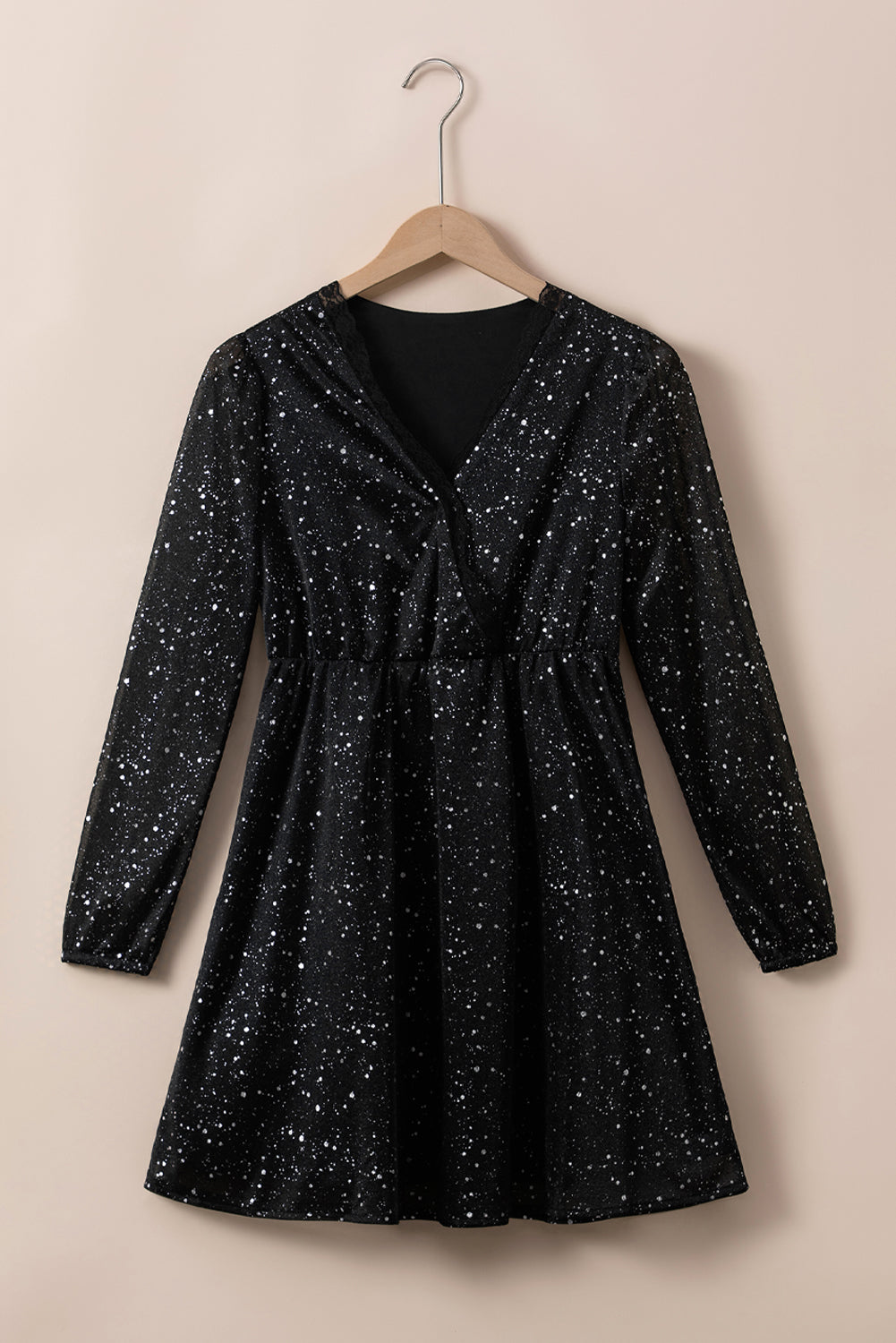 Sylis | Elegant black shimmering dress with mesh sieve