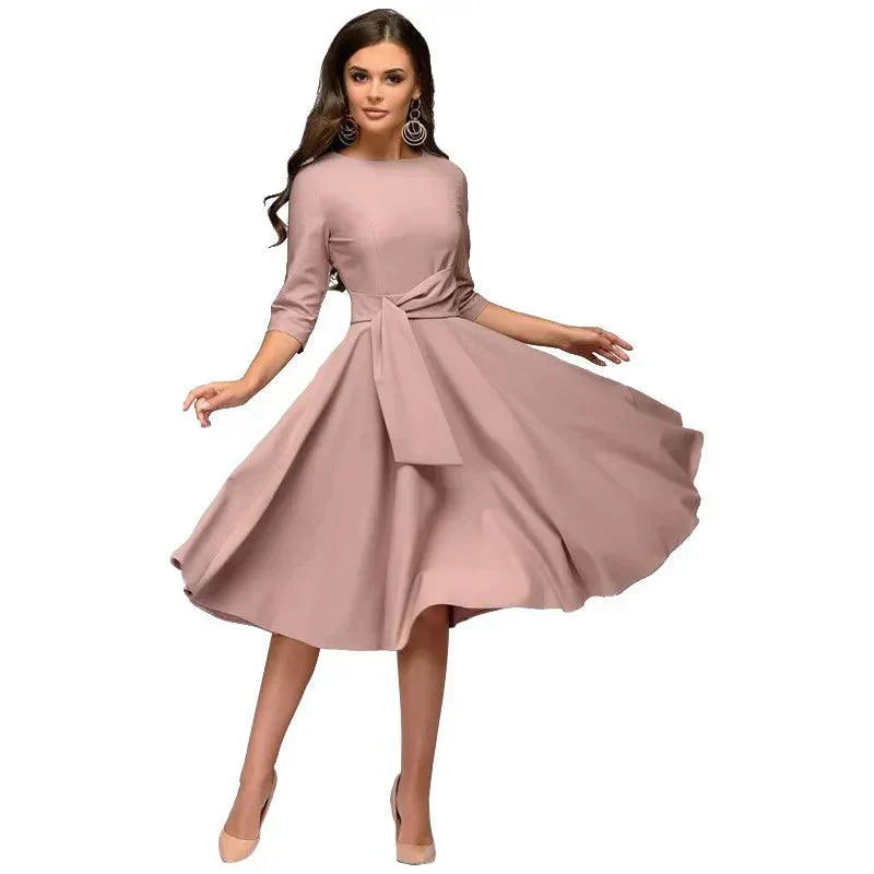 Sylis | Elegant midi dress with feminine silhouette