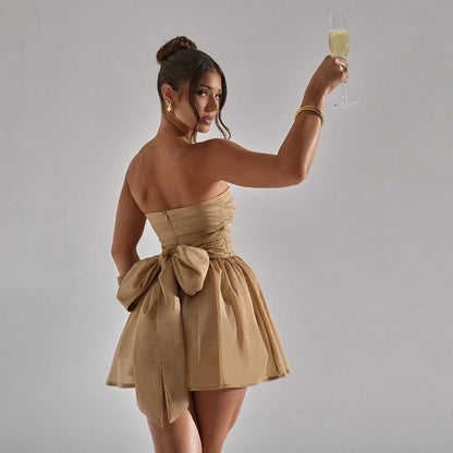 Sylis | Sparkling dress with large bow